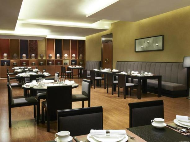 Imagen del bar/restaurante del Hotel Four Points By Sheraton Qingdao, West Coast. Foto 2