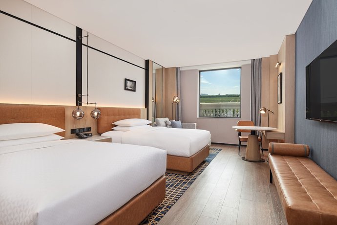 Imagen de la habitación del Hotel Four Points By Sheraton Shanghai Fengjing. Foto 14
