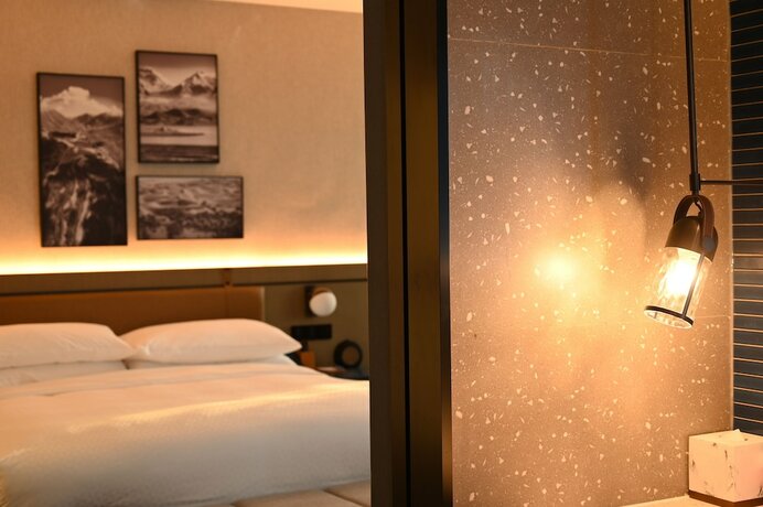 Imagen de la habitación del Hotel Four Points By Sheraton Urumqi. Foto 11