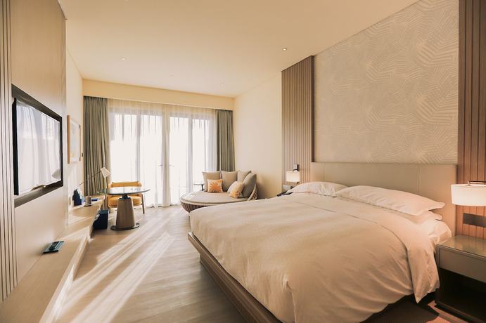 Imagen de la habitación del Hotel Four Points By Sheraton Wuchuan, Loong Bay. Foto 6