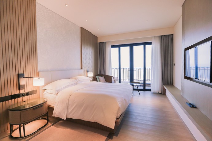 Imagen de la habitación del Hotel Four Points By Sheraton Wuchuan, Loong Bay. Foto 11