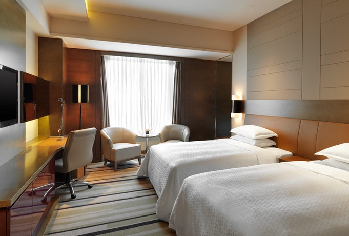 Imagen de la habitación del Hotel Four Points By Sheraton Yangzhou. Foto 8