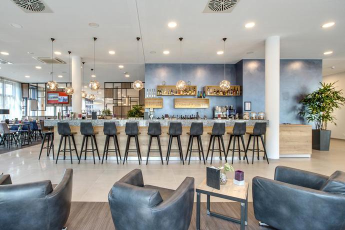 Imagen del bar/restaurante del Hotel Four Points Flex by Sheraton Bochum. Foto 2