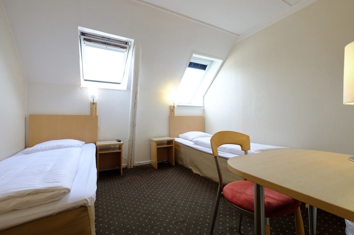 Imagen de la habitación del Hotel Four Points Flex by Sheraton Copenhagen City. Foto 11