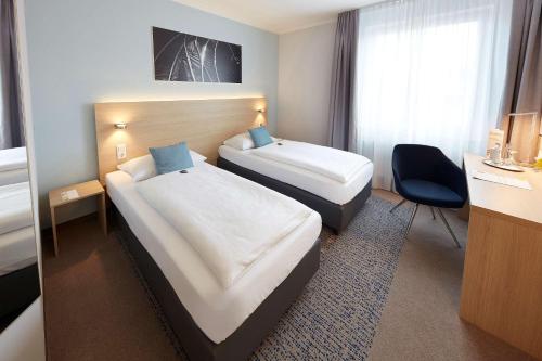 Imagen de la habitación del Hotel Four Points Flex by Sheraton Göttingen. Foto 3
