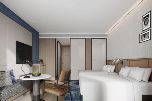 Imagen de la habitación del Hotel Four Points by Sheraton Changchun West. Foto 9