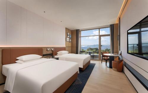 Imagen de la habitación del Hotel Four Points by Sheraton Dali, Erhai. Foto 14