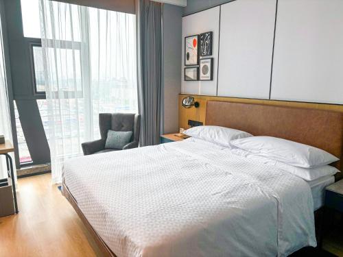 Imagen de la habitación del Hotel Four Points by Sheraton Datong Pingcheng. Foto 20