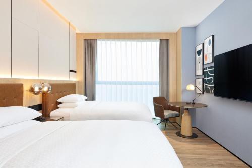 Imagen general del Hotel Four Points by Sheraton Huzhou. Foto 7