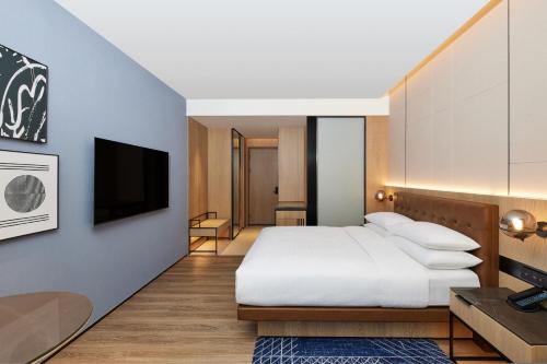 Imagen de la habitación del Hotel Four Points by Sheraton Huzhou. Foto 19