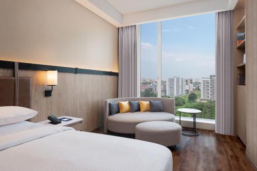 Imagen de la habitación del Hotel Four Points by Sheraton Nashik. Foto 15