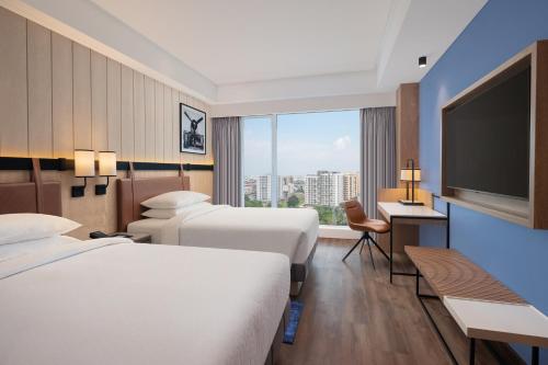 Imagen de la habitación del Hotel Four Points by Sheraton Nashik. Foto 17