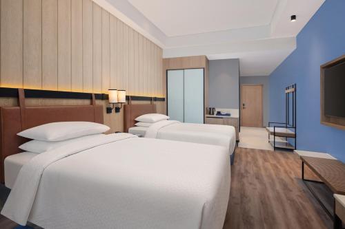 Imagen de la habitación del Hotel Four Points by Sheraton Nashik. Foto 19
