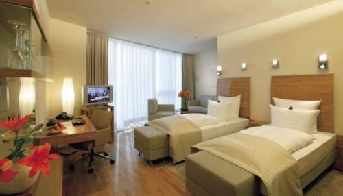 Imagen de la habitación del Hotel Four Points by Sheraton Panoramahaus. Foto 17