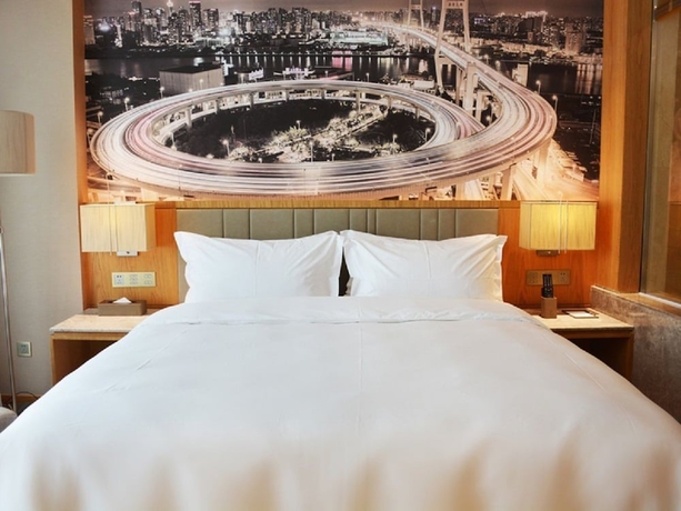 Imagen de la habitación del Hotel Four Points by Sheraton Shanghai Kangqiao. Foto 5