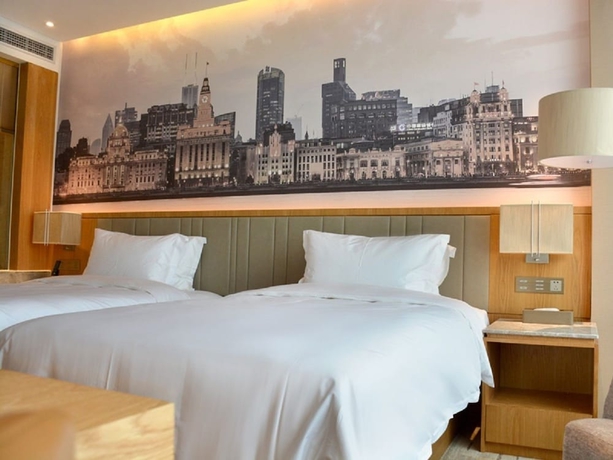 Imagen de la habitación del Hotel Four Points by Sheraton Shanghai Kangqiao. Foto 7