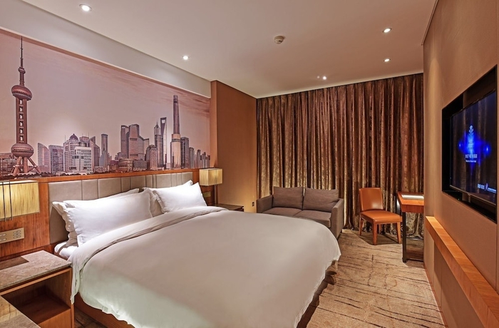 Imagen de la habitación del Hotel Four Points by Sheraton Shanghai Kangqiao. Foto 9
