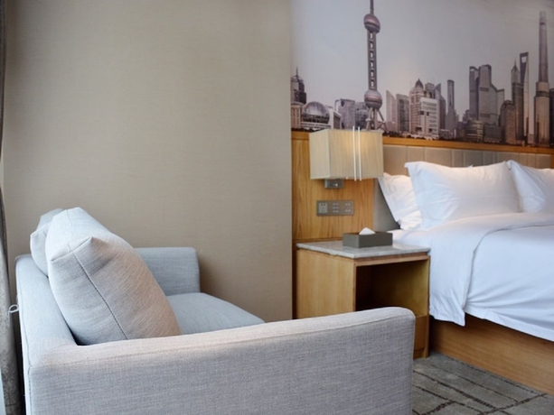 Imagen de la habitación del Hotel Four Points by Sheraton Shanghai Kangqiao. Foto 11
