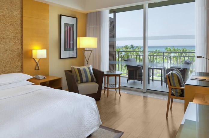 Imagen de la habitación del Hotel Four Points by Sheraton Shenzhou Peninsula. Foto 14