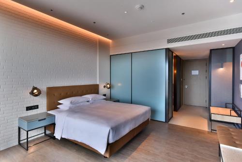 Imagen de la habitación del Hotel Four Points by Sheraton Taipei Bali. Foto 2