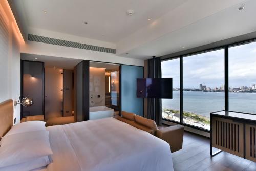 Imagen de la habitación del Hotel Four Points by Sheraton Taipei Bali. Foto 4