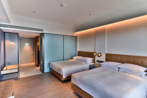 Imagen de la habitación del Hotel Four Points by Sheraton Taipei Bali. Foto 5