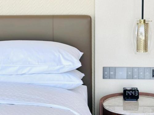 Imagen de la habitación del Hotel Four Points by Sheraton Yantai. Foto 12