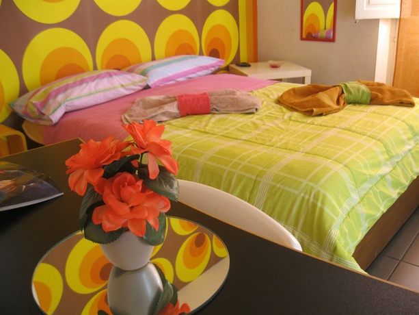 Imagen de la habitación del Hotel Four Rooms. Foto 9