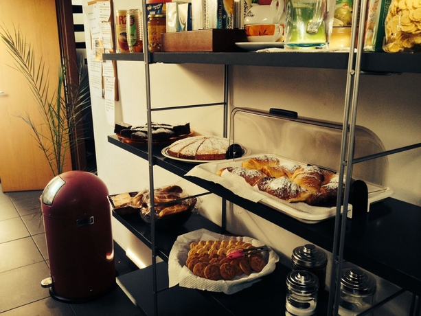 Imagen del bar/restaurante del Hotel Four Rooms. Foto 4