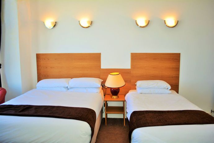 Imagen del bar/restaurante del Hotel Four Saints Brig Y Don. Foto 3