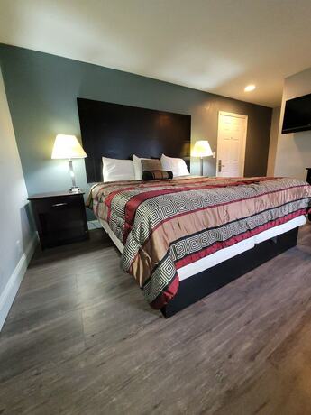 Imagen de la habitación del Hotel Four Season Motel. Foto 10