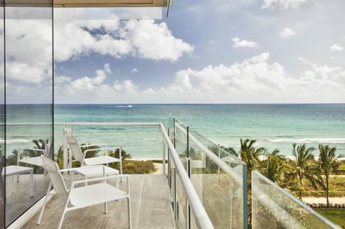 Imagen de la habitación del Hotel Four Seasons At The Surf Club. Foto 9