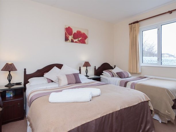 Imagen de la habitación del Hotel Four Seasons BandB. Foto 5