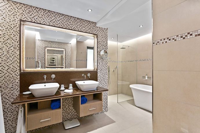 Imagen de la habitación del Hotel Four Seasons Country Club. Foto 3