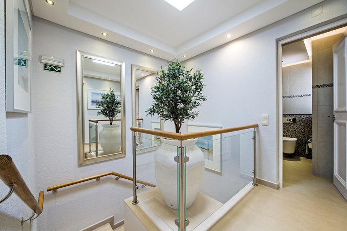 Imagen de la habitación del Hotel Four Seasons Country Club. Foto 7