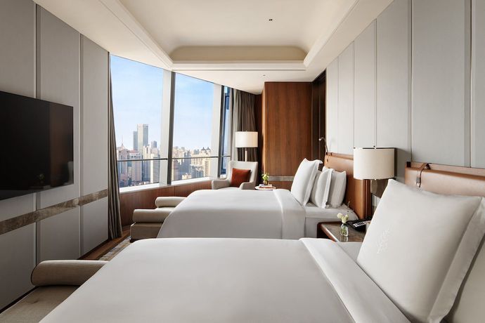 Imagen de la habitación del Hotel Four Seasons Dalian. Foto 8