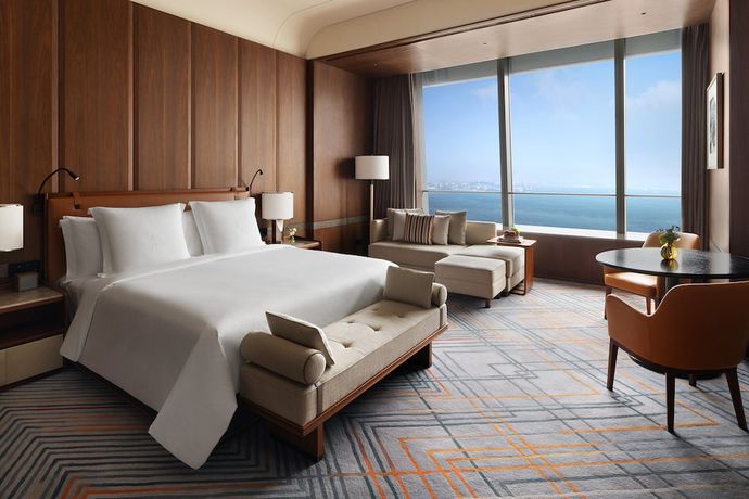 Imagen de la habitación del Hotel Four Seasons Dalian. Foto 12