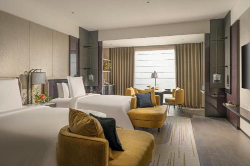 Imagen de la habitación del Hotel Four Seasons Hangzhou at Hangzhou Centre. Foto 17