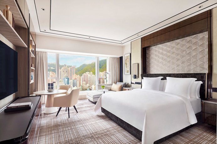 Imagen de la habitación del Hotel Four Seasons Hong Kong. Foto 8