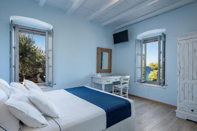 Imagen de la habitación del Hotel Four Seasons Hydra. Foto 5