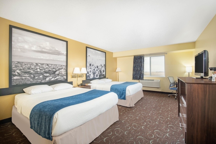 Imagen de la habitación del Hotel Four Seasons Inn. Foto 7