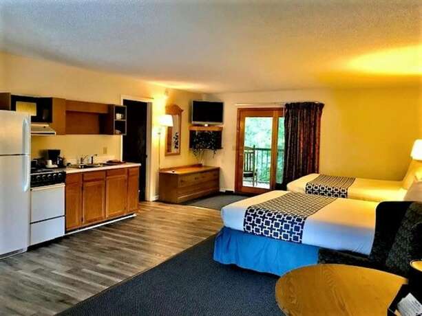 Imagen de la habitación del Hotel Four Seasons Inn. Foto 8