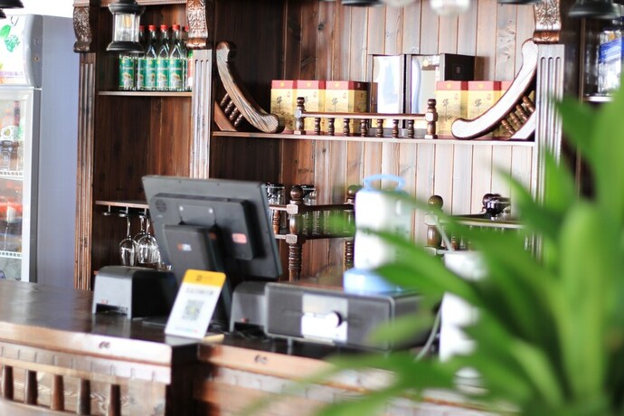 Imagen del bar/restaurante del Hotel Four Seasons Inn Gubei Water Town. Foto 13