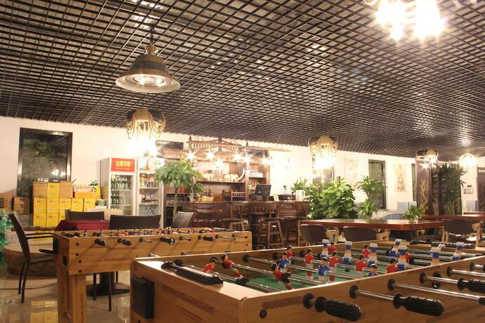 Imagen del bar/restaurante del Hotel Four Seasons Inn Gubei Water Town. Foto 14