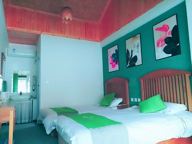 Imagen de la habitación del Hotel Four Seasons Inn Gubei Water Town. Foto 18