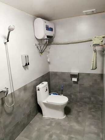 Imagen de la habitación del Hotel Four Seasons Inn Gubei Water Town. Foto 22