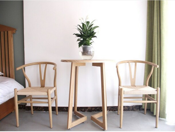 Imagen de la habitación del Hotel Four Seasons Inn Gubei Water Town. Foto 24