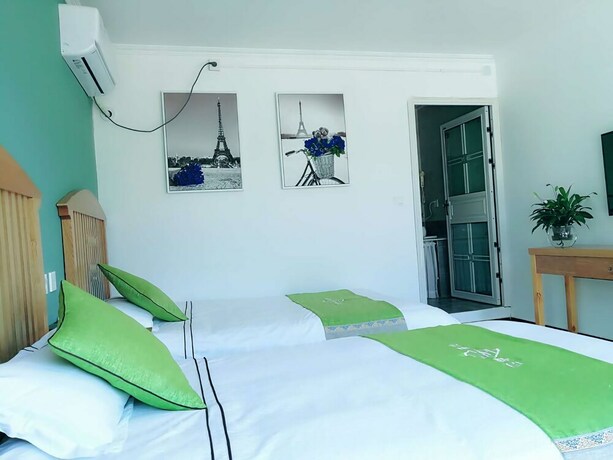 Imagen de la habitación del Hotel Four Seasons Inn Gubei Water Town. Foto 29