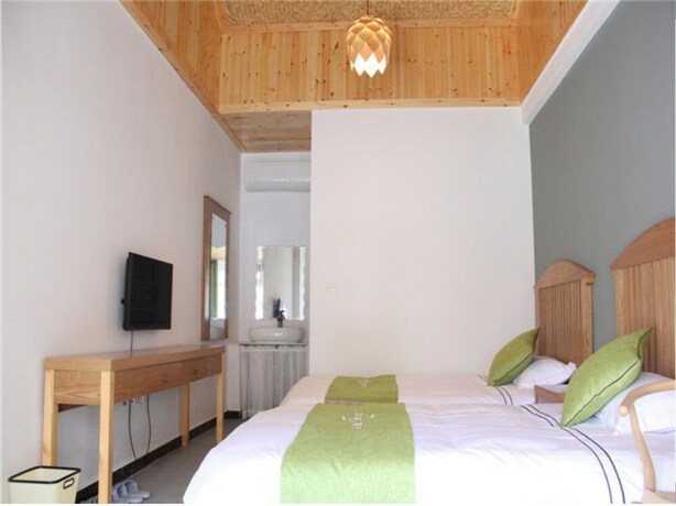 Imagen de la habitación del Hotel Four Seasons Inn Gubei Water Town. Foto 30