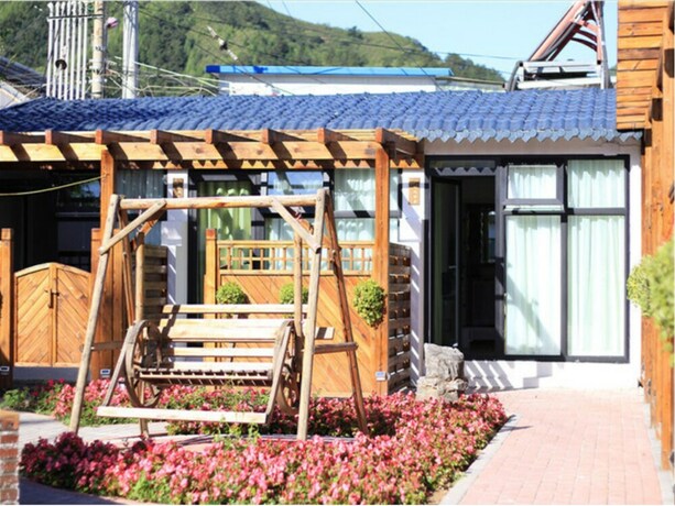 Imagen de los interiores del Hotel Four Seasons Inn Gubei Water Town. Foto 35